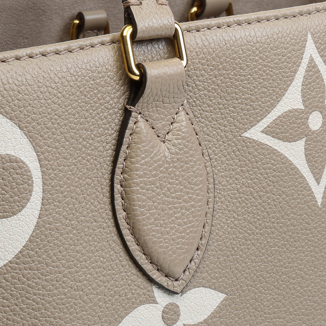 LOUIS VUITTON Bicolor Monogram Empreinte Onthego MM - Dove