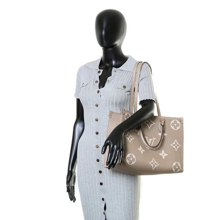 LOUIS VUITTON Bicolor Monogram Empreinte Onthego MM - Dove