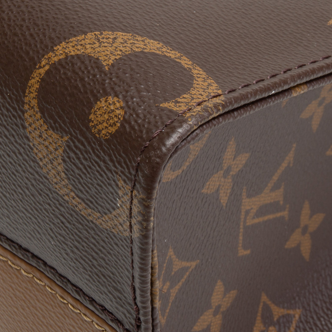 LOUIS VUITTON Reverse Monogram Giant Onthego PM