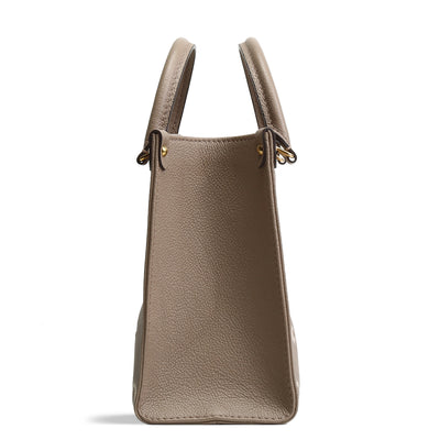 LOUIS VUITTON BiColor Monogram Empreinte OnTheGo PM - Dove/Cream