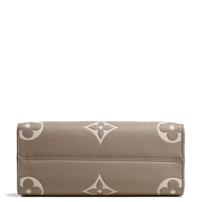 LOUIS VUITTON BiColor Monogram Empreinte OnTheGo PM - Dove/Cream